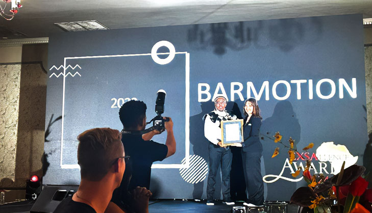 Kelsey Humby collecting the EXSA Award for Delivering Exceptional Services and Products, at Cedarwoods of Sandton, 18 January 2024